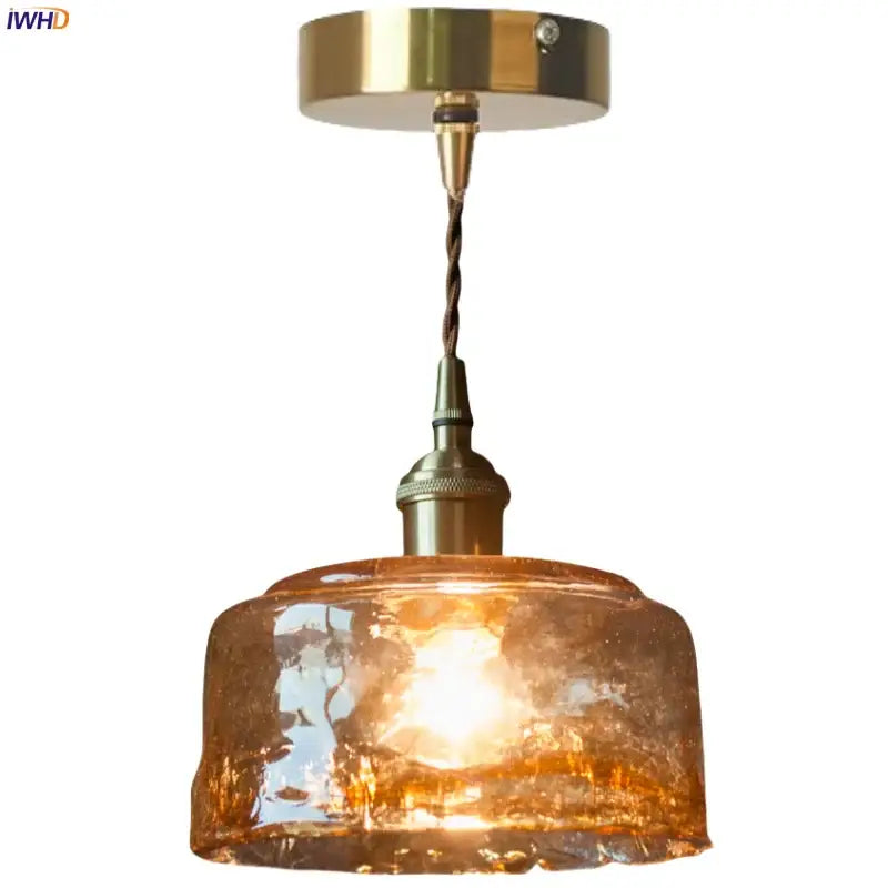 Vintage brass amber glass pendant light featuring warm amber textured glass and brass amber glass fixture for kitchen island decorbites pendant light