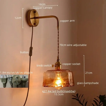 Vintage brass and amber glass copper led wall sconce with textured amber glass shade and adjustable twisted wire