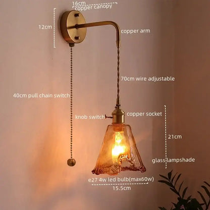 Copper finished vintage brass wall sconce with textured amber glass copper led lampshade and adjustable twisted wire arm