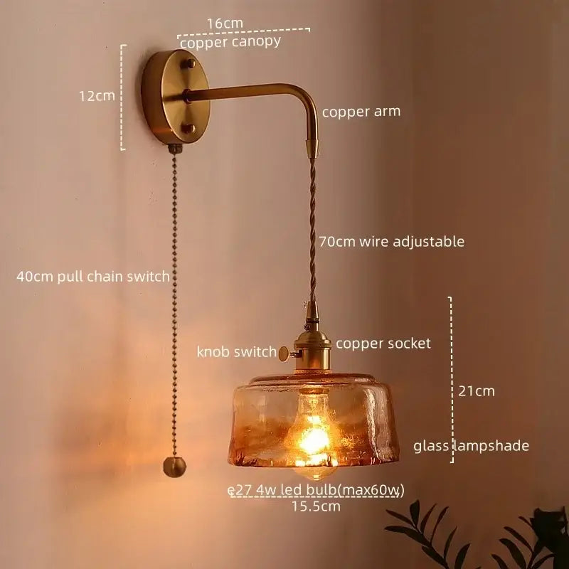 Copper-finished wall sconce with textured amber glass copper led lampshade and adjustable twisted wire arm for bedroom light