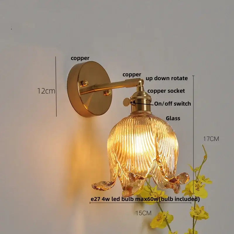 Vintage brass wall light with copper finish and loft amber glass shade shaped like an open flower for bedroom decorbites loft amber