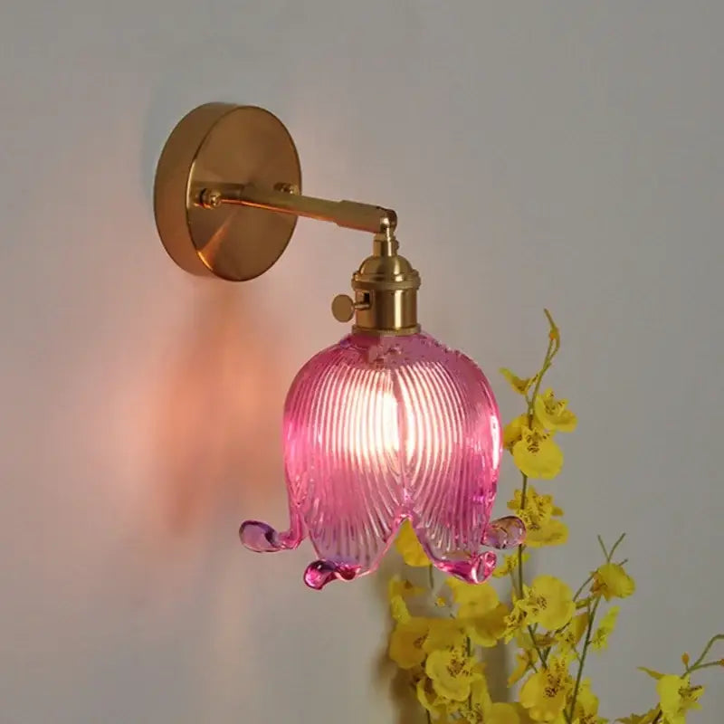 Vintage brass and loft amber glass wall light featuring a pink ribbed flower sconce for bedroom decorbites loft amber