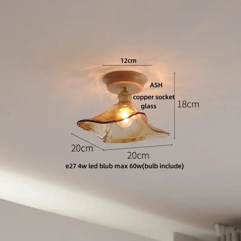 Vintage brass and clear glass led ceiling light with warm-toned hand-blown glass and ash wood mount decorbites clear glass