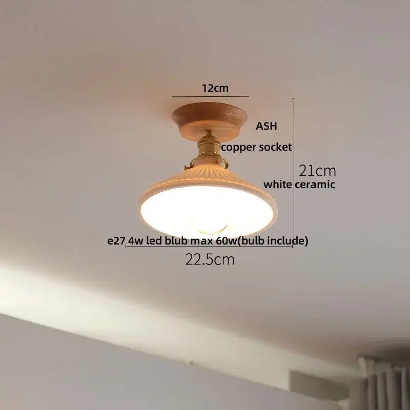A warm-toned vintage ceiling light with wooden base copper socket and white ceramic shade for decorbites clear glass led lighting