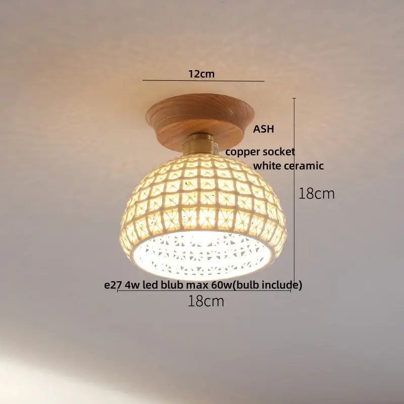 Vintage brass and clear glass led ceiling light featuring a warm-toned woven white ceramic pendant with wood base and copper socket