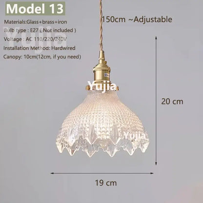 Model 13 pendant light with clear glass textured shade and brass-finished metal components, ideal kitchen lighting