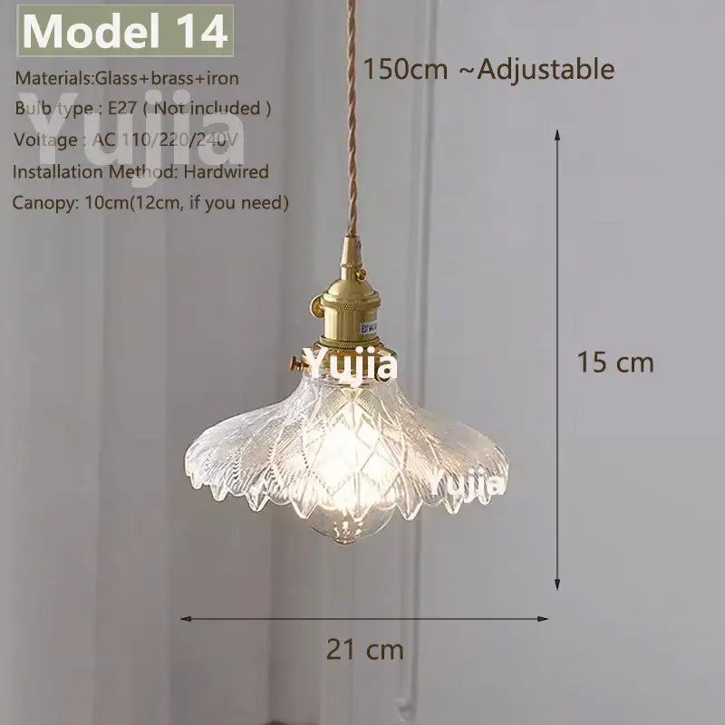 Vintage brass pendant light with a clear glass floral shade and adjustable 150cm cord for kitchen lighting
