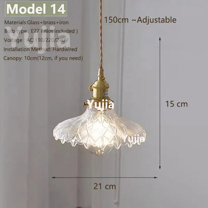 Vintage brass pendant light with a clear glass floral shade and adjustable 150cm cord for kitchen lighting