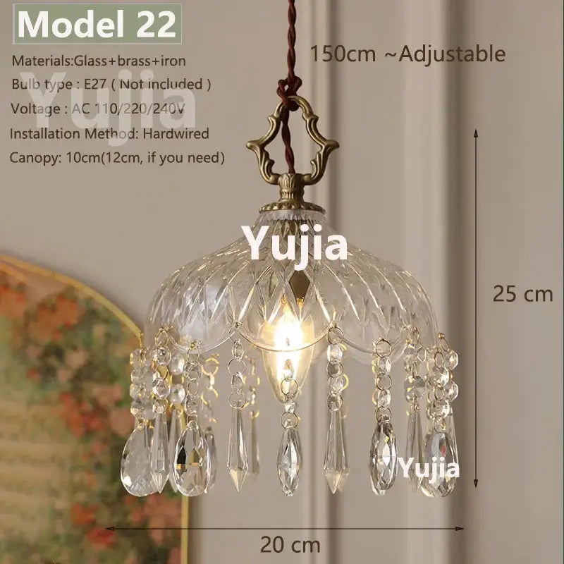 Vintage brass pendant light with clear glass teardrop charms and polished copper frame for kitchen lighting