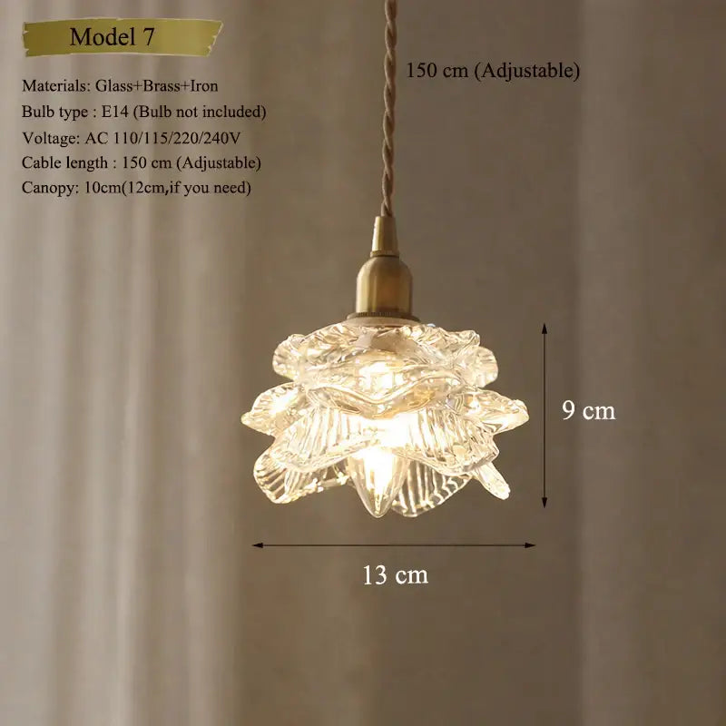Vintage brass pendant light with clear glass floral shade and polished copper finish featuring adjustable 150 cm cord