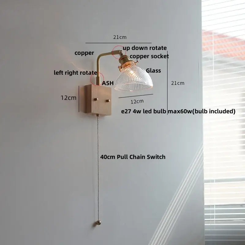 Vintage brass wall lamp with ribbed glass pink led shade, adjustable arm, and pull chain switch for bedroom sconce