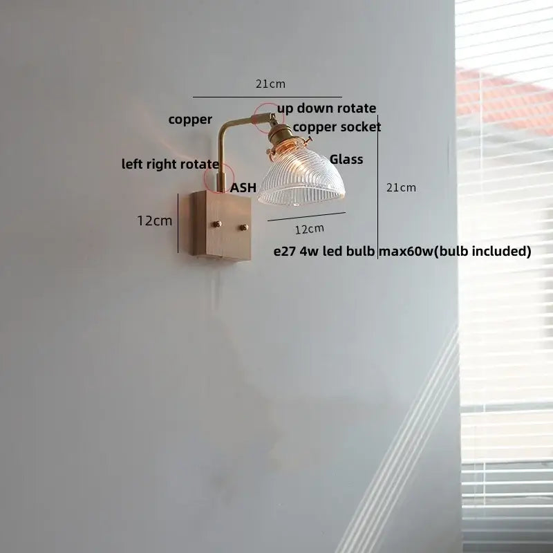 Copper-finished vintage brass wall sconce with ribbed glass pink led shade and adjustable arm for bedroom bedside lamp