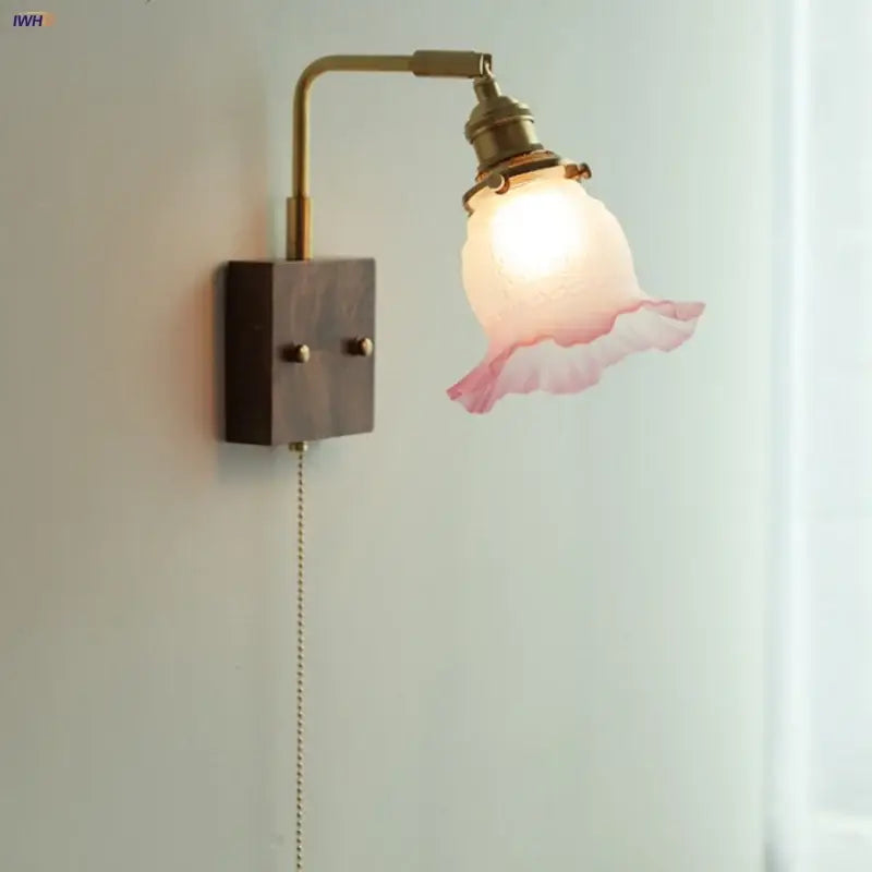 Vintage brass and glass pink led wall sconce with translucent ruffled shade for bedroom bedside lighting