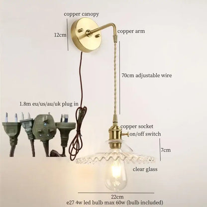 Vintage brass and green glass led wall light with antique brass-finished copper sconce and adjustable wire shade