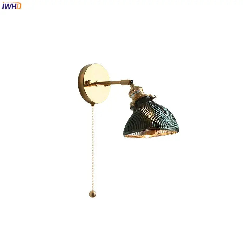 Vintage brass and green glass led wall light with ribbed shade and adjustable arm for bedroom wall lights