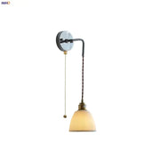 Vintage brass wall sconce with ribbed off-white glass shade and twisted cord for decorbites ceramic led wall lighting