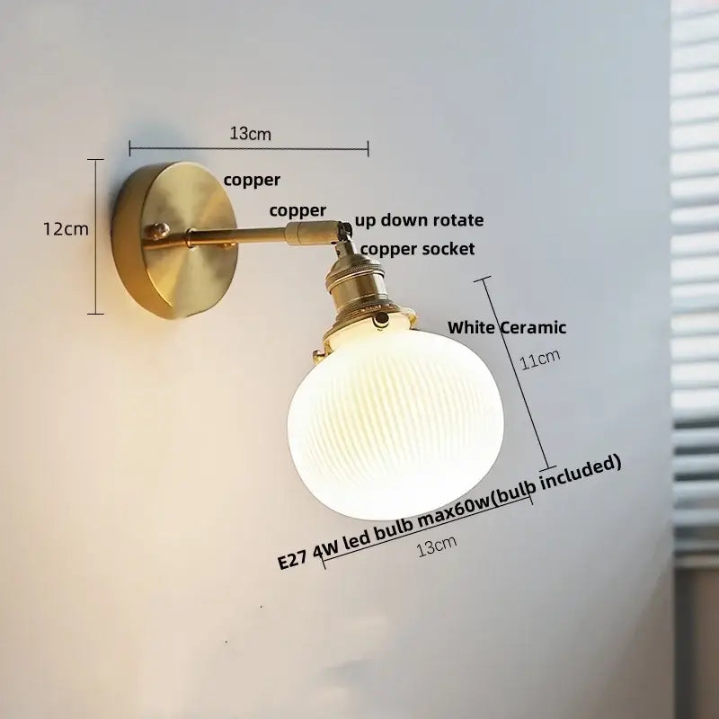Vintage brass wall light with copper finish and white ribbed ceramic led globe for bathroom mirror decorbites ceramic led