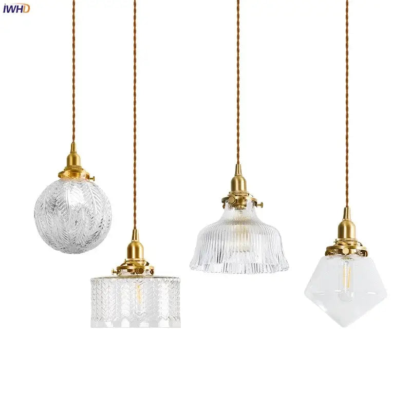 Four elegant vintage brass and textured glass led pendant lamps with twisted copper cords for dining room lighting