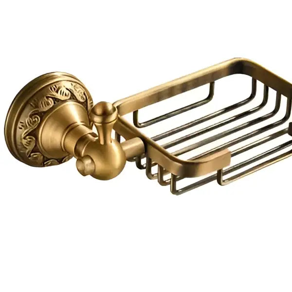 Antique brass wall-mounted soap dish with ornate scrollwork and grid basket in decorbites brass bathroom accessories set