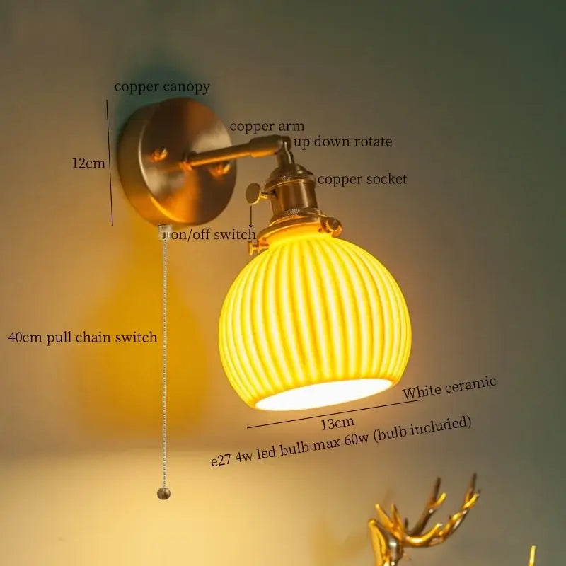 A warm yellow ribbed white ceramic wall lamp with copper finish arm and pull chain switch vintage brass ceramic led decorbites