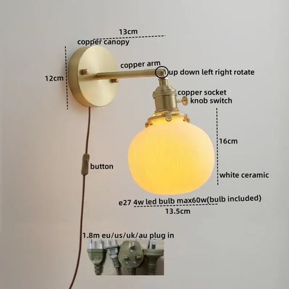 Vintage brass ceramic led wall light with a white ceramic globe shade and brass-finished copper arm for decorbites ceramic led wall use