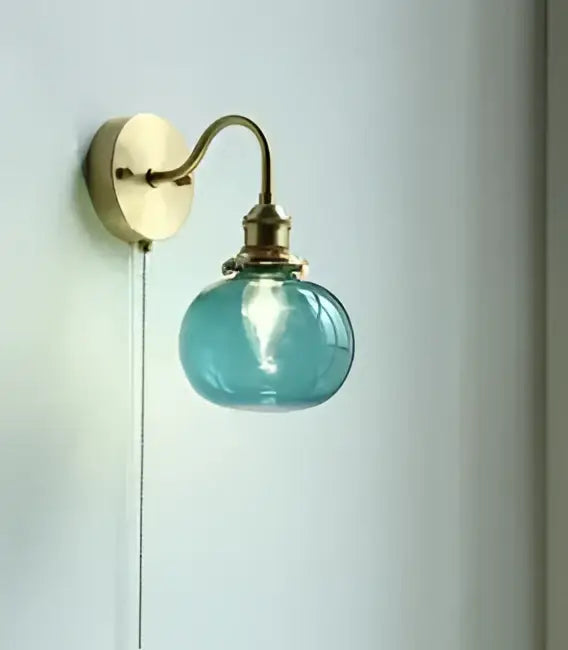 Vintage brass ceramic wall lamp with blue glass globe and knob switch ideal for bedroom decorbites ceramic wall sconce