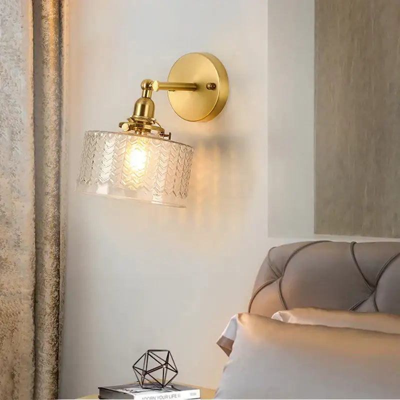Gold-finished vintage brass led wall lamp with clear glass chevron textured shade for bedroom sconce lighting
