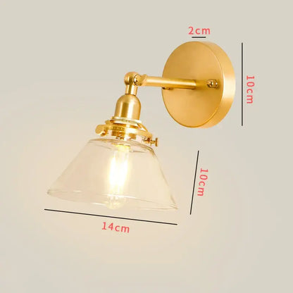 Gold finished brass wall lamp with clear glass bell shaped shade featuring a vintage chevron led wall design