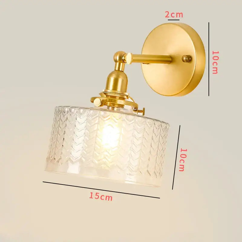 Vintage brass led wall lamp with clear glass shade featuring intricate chevron pattern for bedroom sconce lighting