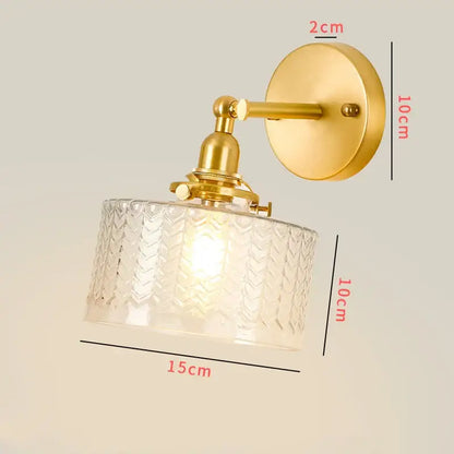 Vintage brass chevron clear glass led wall lamp featuring a metal arm and intricate glass shade for bedroom sconce use