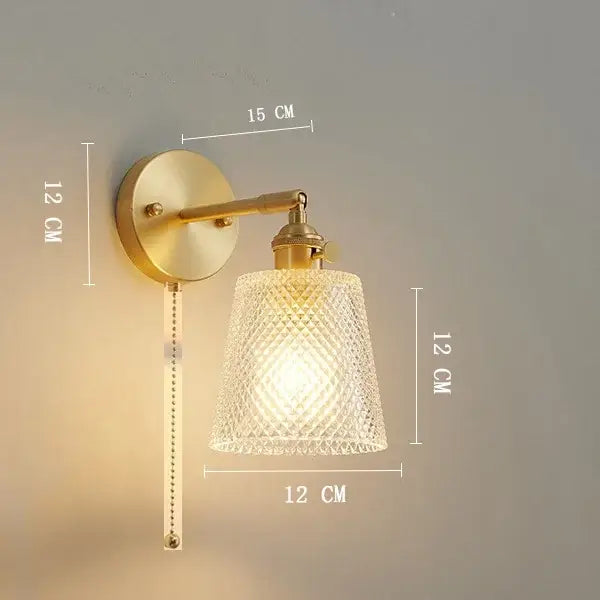 Vintage brass wall light with clear glass textured shade designed for bedroom decorbites clear glass sconce