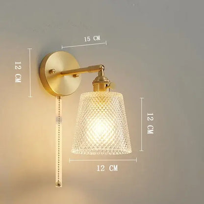 Vintage brass wall light with clear glass textured shade designed for bedroom decorbites clear glass sconce