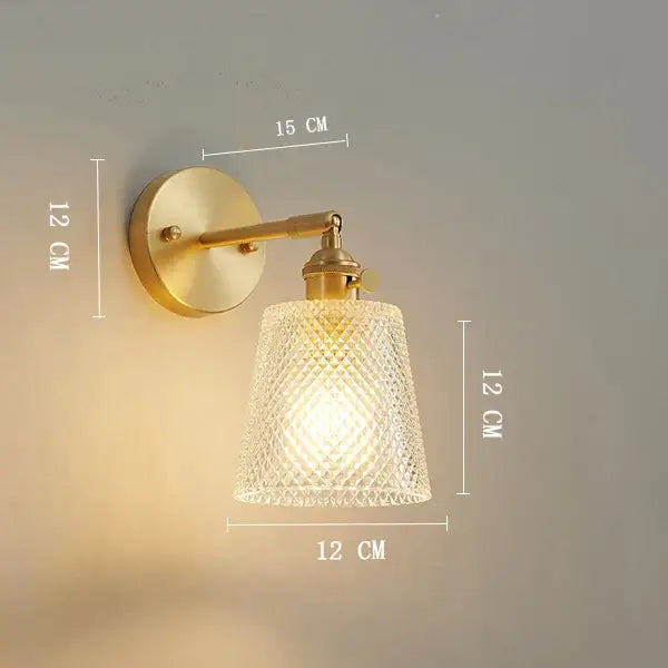 Vintage brass clear glass wall light with textured shade featuring decorbites clear glass for elegant bedroom decor