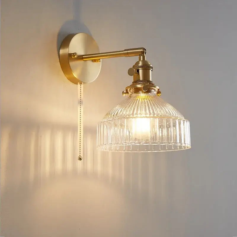 Vintage brass wall light with clear glass ribbed shade and pull-chain switch from decorbites clear glass collection