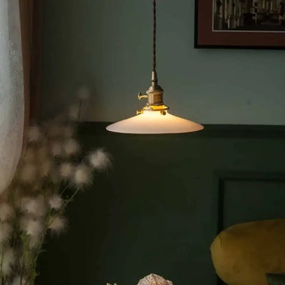 Antique brass-finished vintage pendant light with cream decorbites cream glass led frosted shade for dining room decor