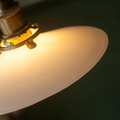 Warm-toned cream glass led pendant light with brass fixture for dining room decorbites cream glass pendant lights