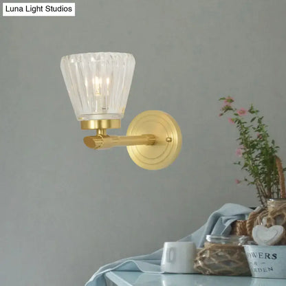 Vintage brass crystal cone bedroom wall sconce with gold-finished fixture and faceted clear glass shade, inch fixture height