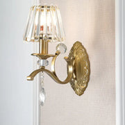 Vintage brass wall sconce with gold-toned crystal fringe shade and e14 bulb base for elegant living room lighting