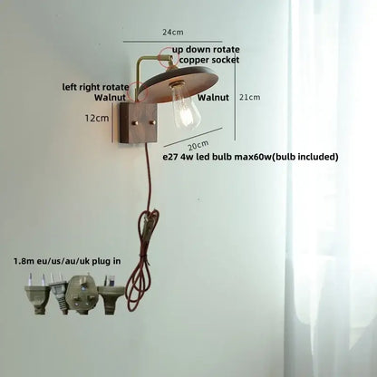 Vintage brass and dark wood wall light sconce with walnut base copper arm and exposed edison bulb by decorbites copper
