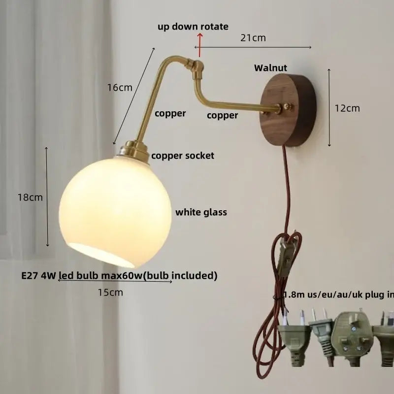 Vintage brass flower led wall light with brass finish copper, round white globe, walnut backplate, and rotate pull chain
