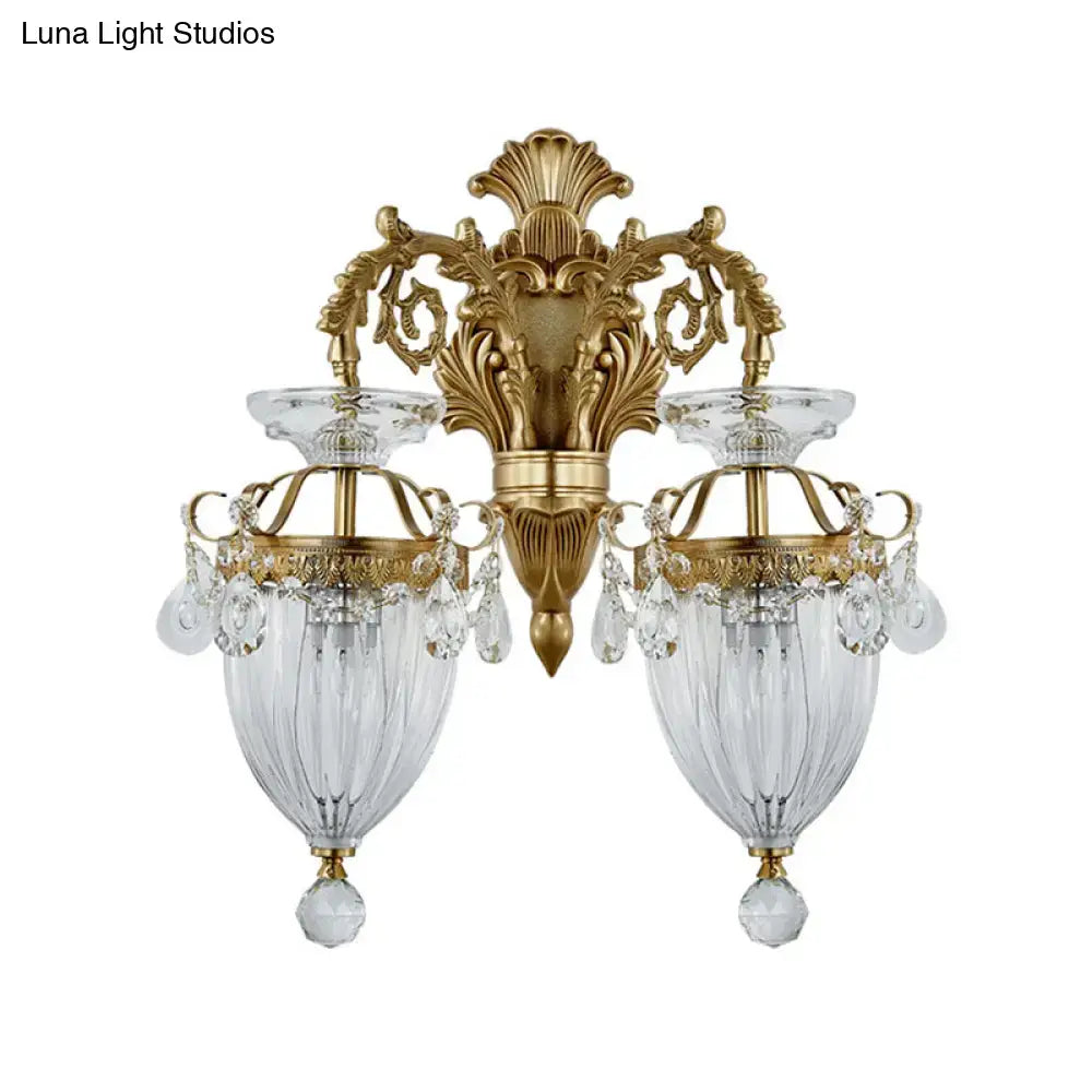 Gold-finished vintage wall lamp with fluted glass shades and crystals, ornate design, approximately 12 inches high