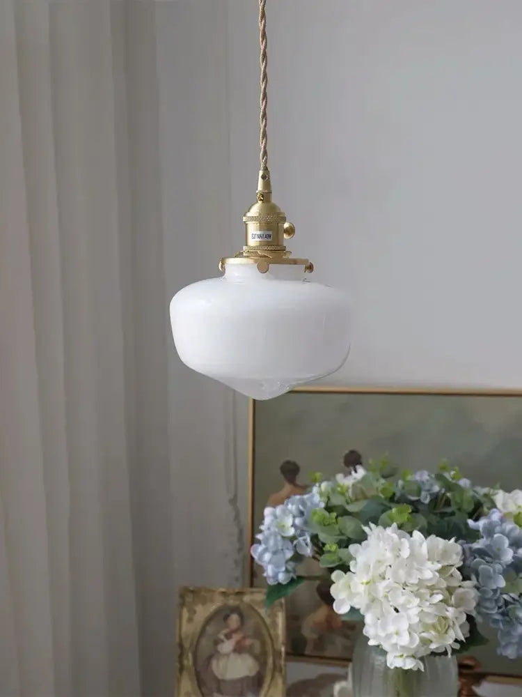 Vintage brass pendant lamp with frosted white glass shade led and twisted gold-toned cord for kitchen use