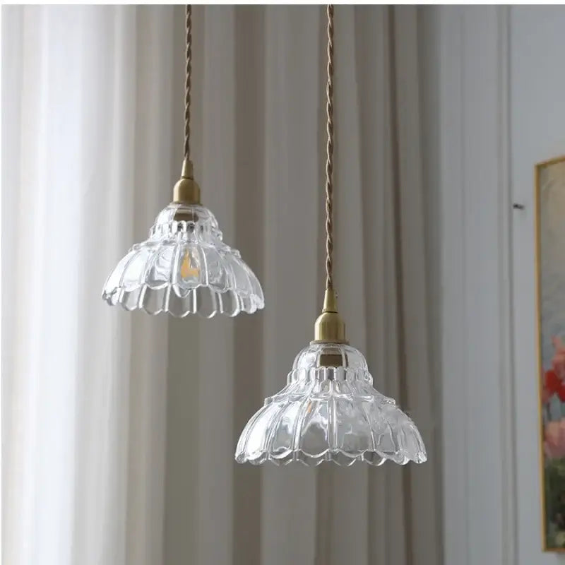 Clear glass led pendant lamp with fluted petal design and vintage brass fixtures for kitchen lighting