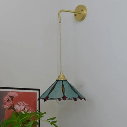 Vintage brass glass led wall sconce with teal stained glass and gold-toned metal decorbites glass brass accents