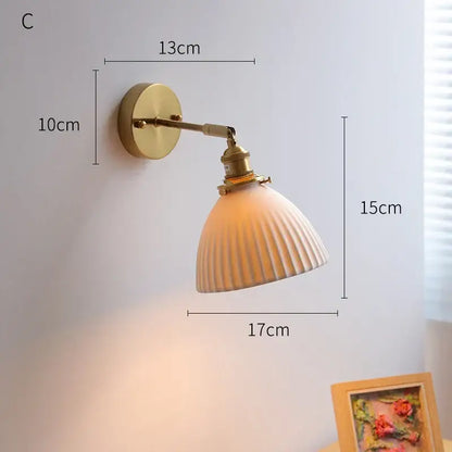 Vintage brass globe wall sconce with warm-toned ribbed glass lampshade and decorbites copper arm led light fixture