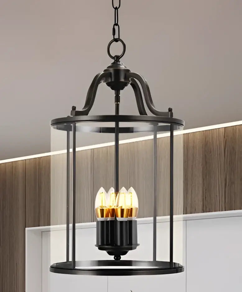 Black wrought iron vintage brass pendant light with clear glass enclosure and led bulbs helps create warm ambiance