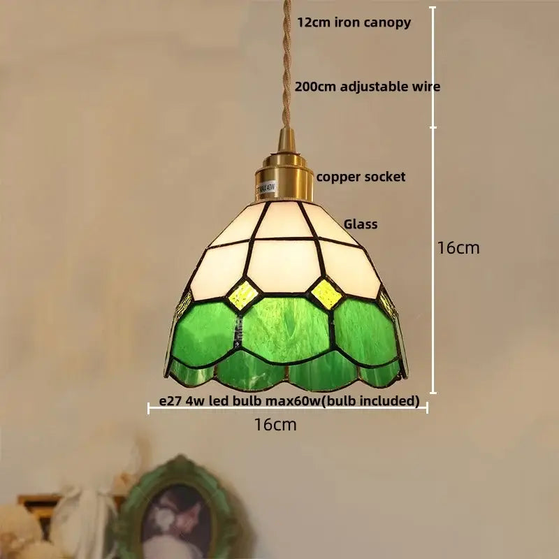 Vintage brass led pendant light featuring a green and white stained glass pendant light with a brass copper socket