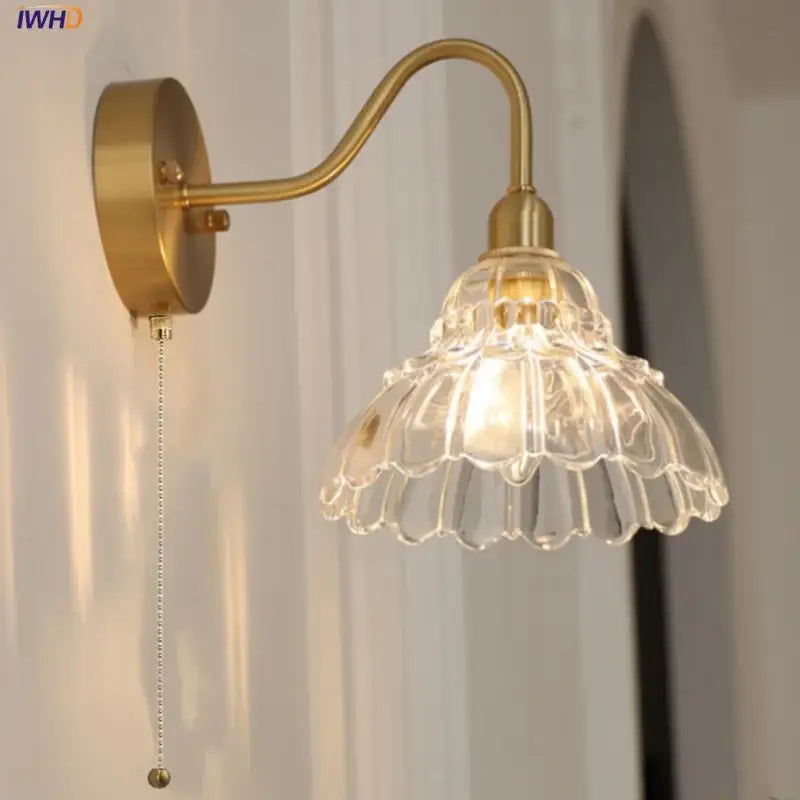 Vintage brass led wall light featuring a clear fluted glass shade and pull-chain switch for bedroom decorbites brass led use