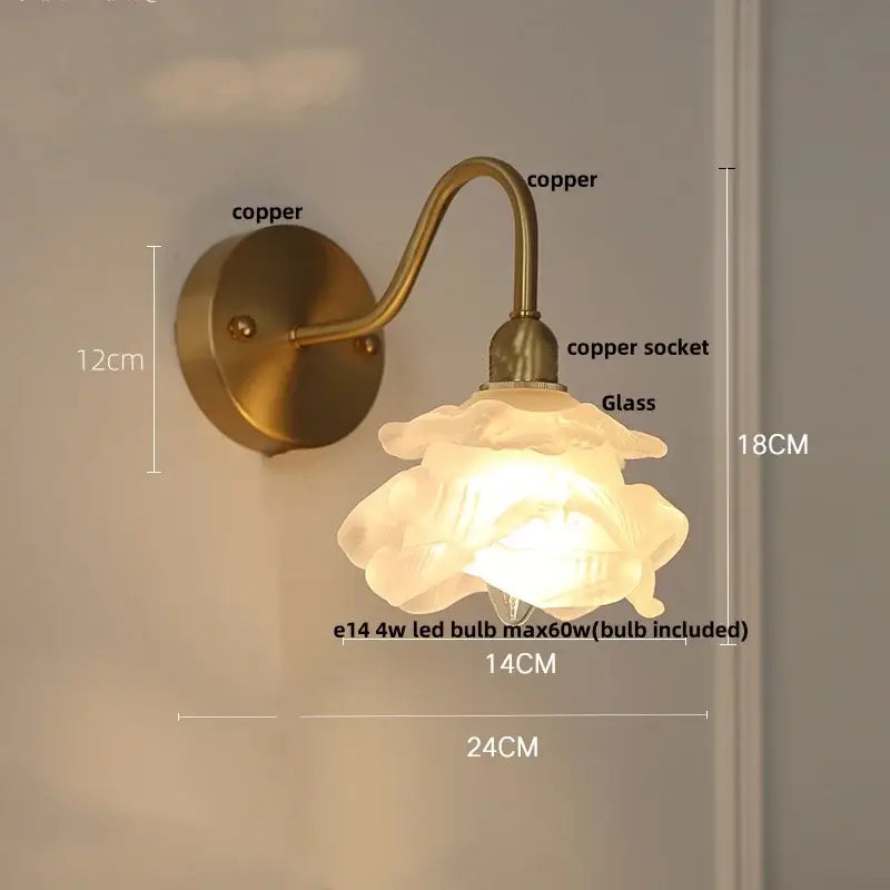 Vintage brass led wall light featuring an antique brass copper sconce with a delicate translucent glass rose shade