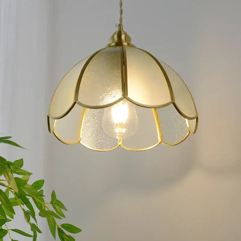 Vintage brass petal glass led pendant light with gold-toned frosted glass petals and warm ambient lighting for kitchen